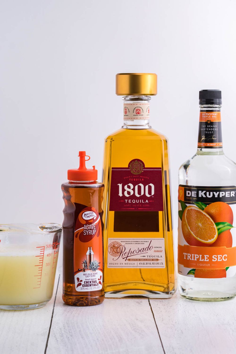 ingredients for a margartia on wooden table