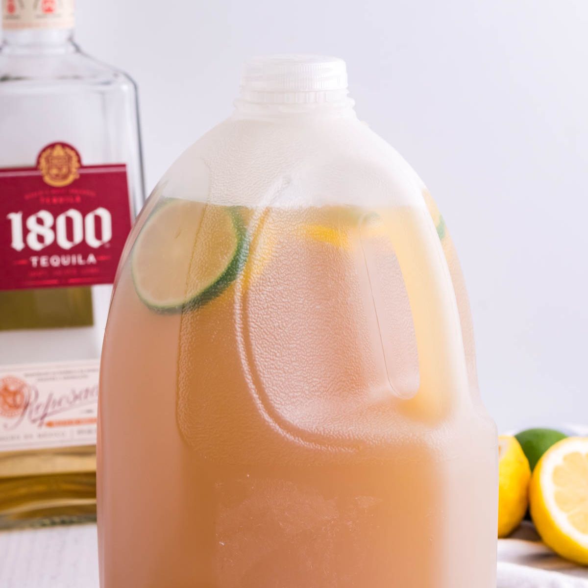 Gallon Margarita mixture in a milk jug