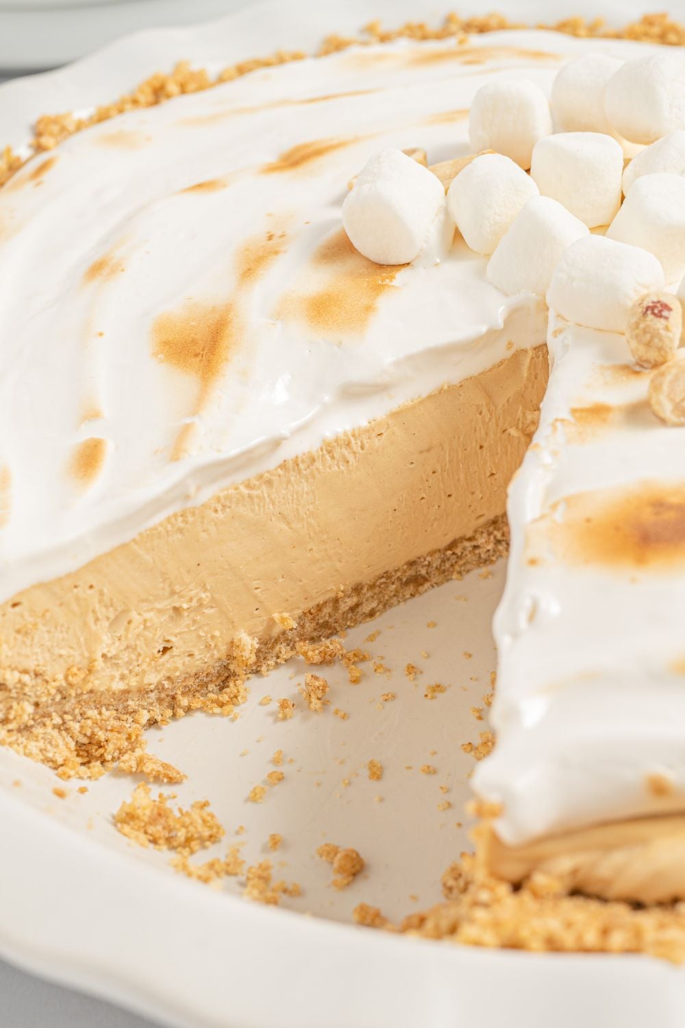 nutty butter pie with slice taken out