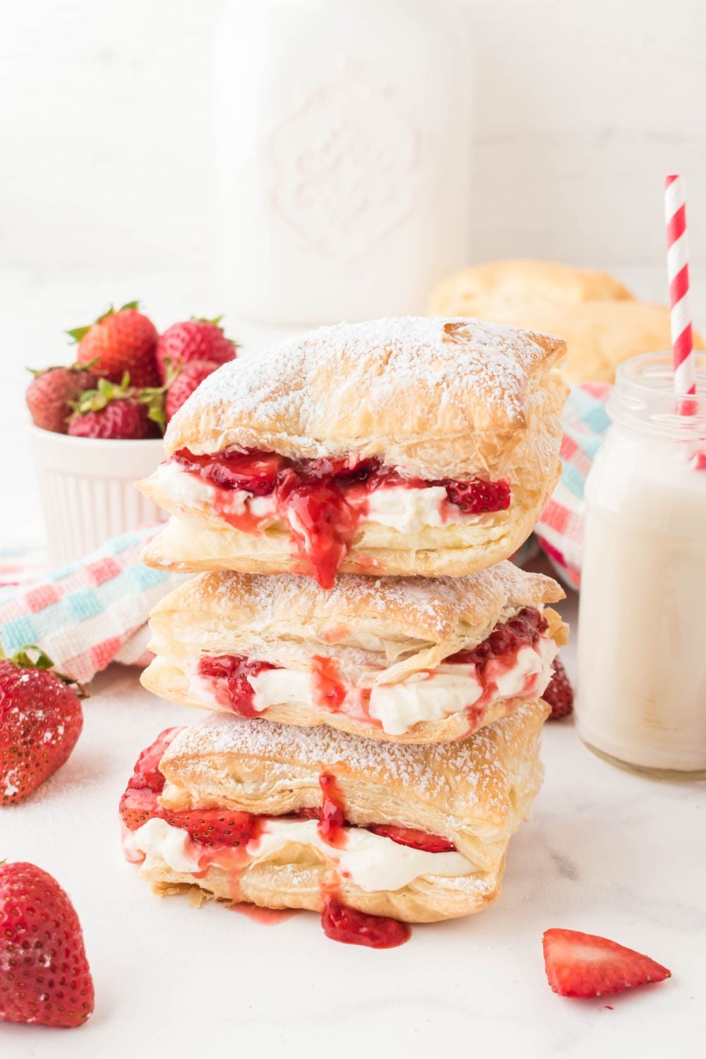 stacked puff pastry desserts on table
