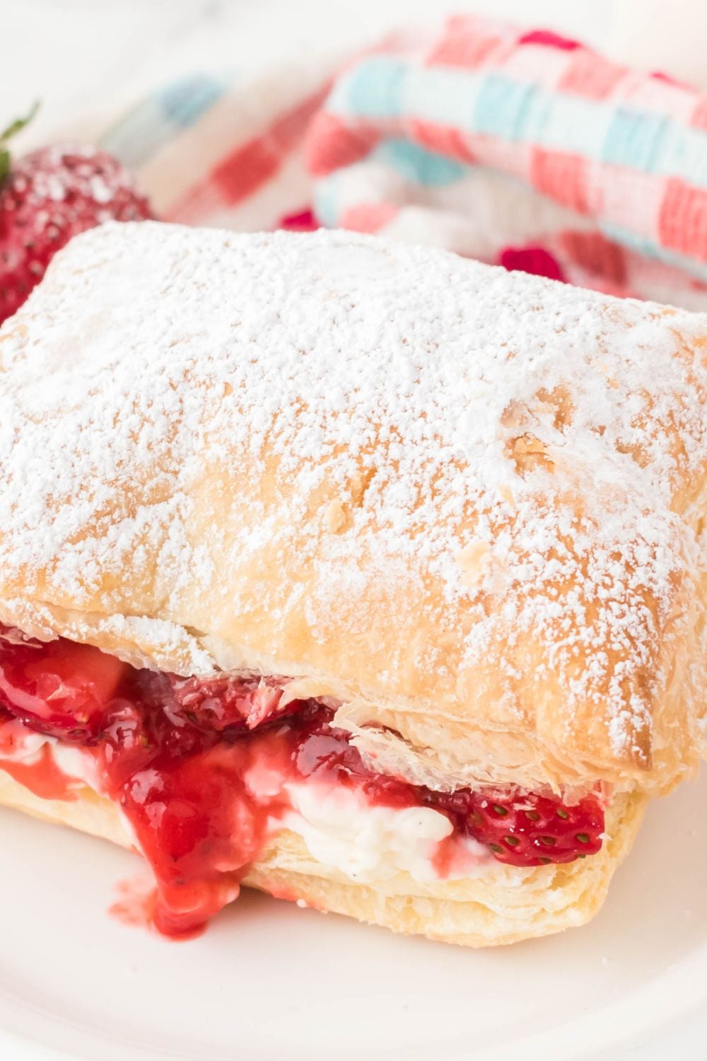puff pastry with strawberries on plate