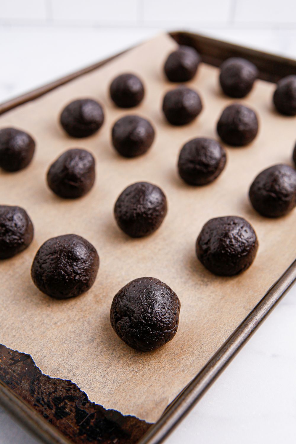 round oreo balls on a cookie tray