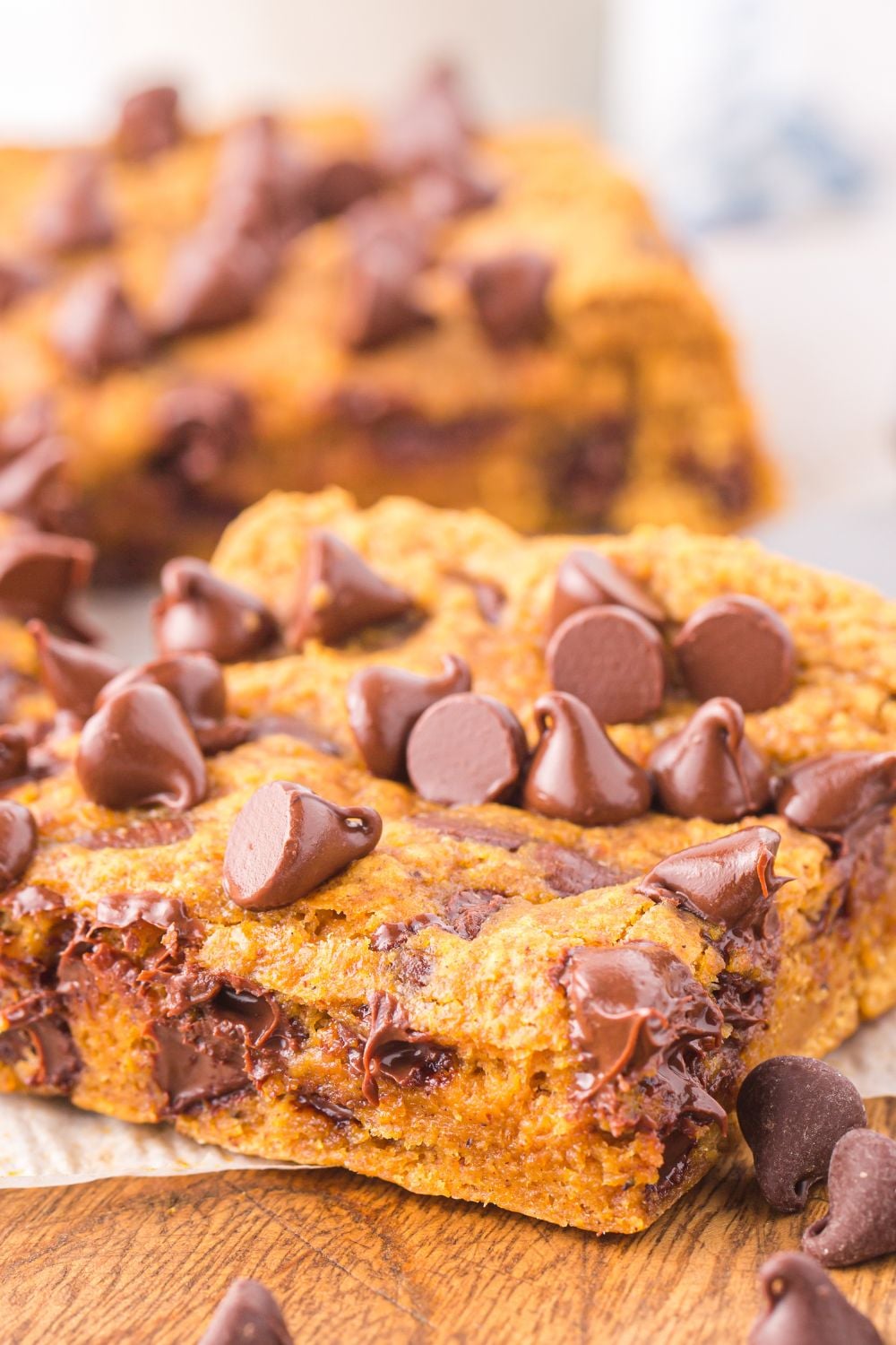 pumpkin chocolate bar on table with chocolate chips around it