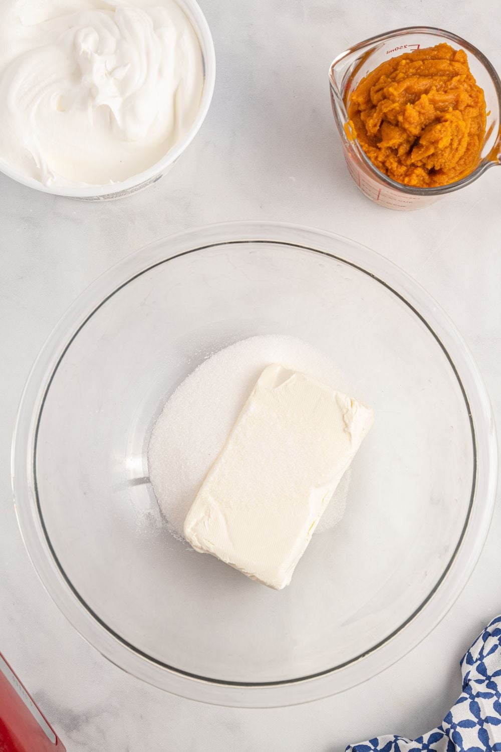 cream cheese in a glass bowl on table