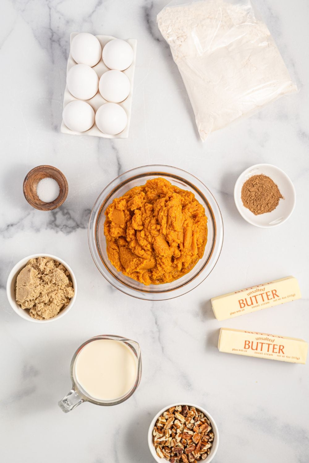 Pumpkin Dump Cake ingredients on marble counter top
