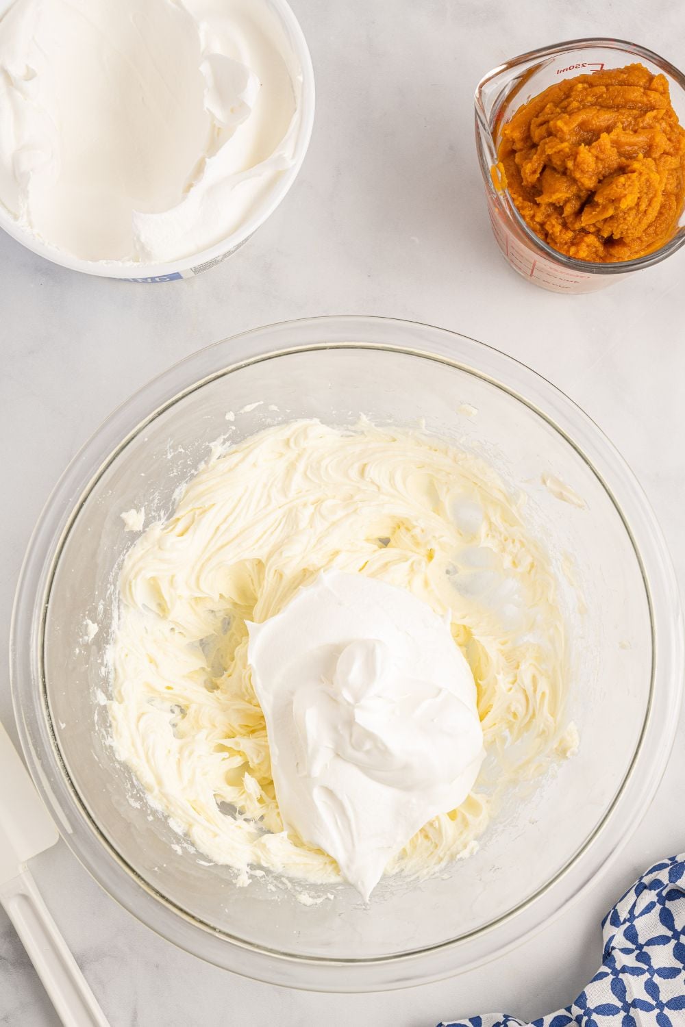 whipped cream mixture in a glass bowl