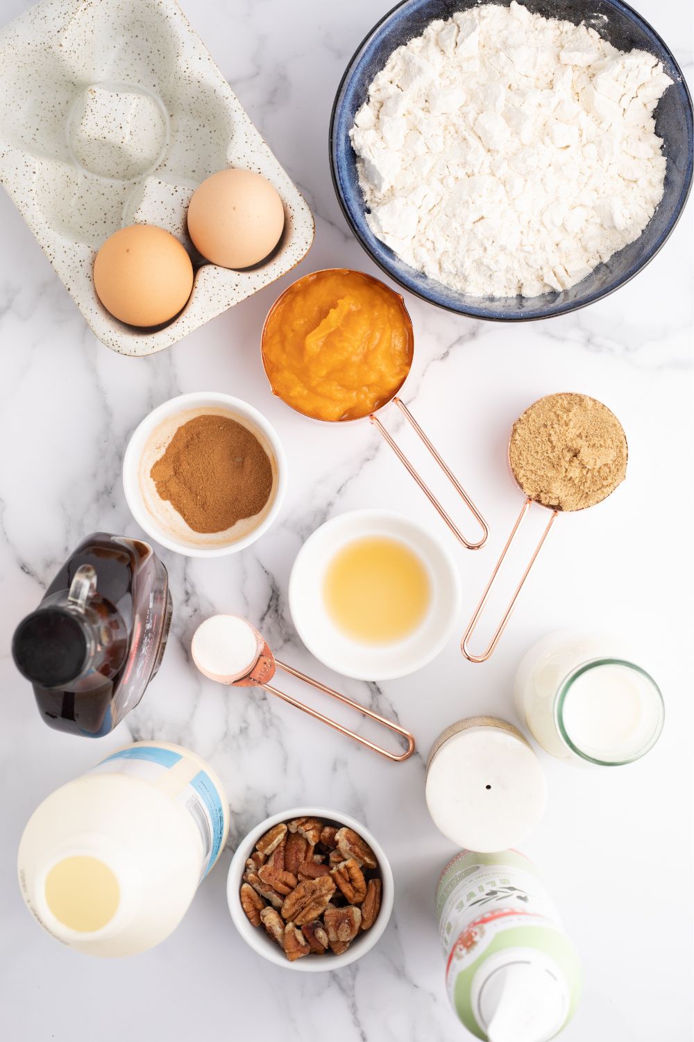 pumpkin spice pancakes ingredients on table