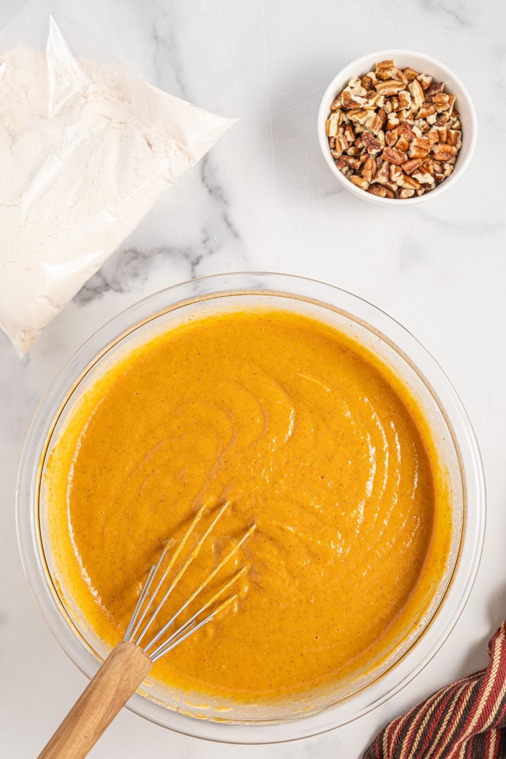 raw pumpkin pie mix in a glass bowl