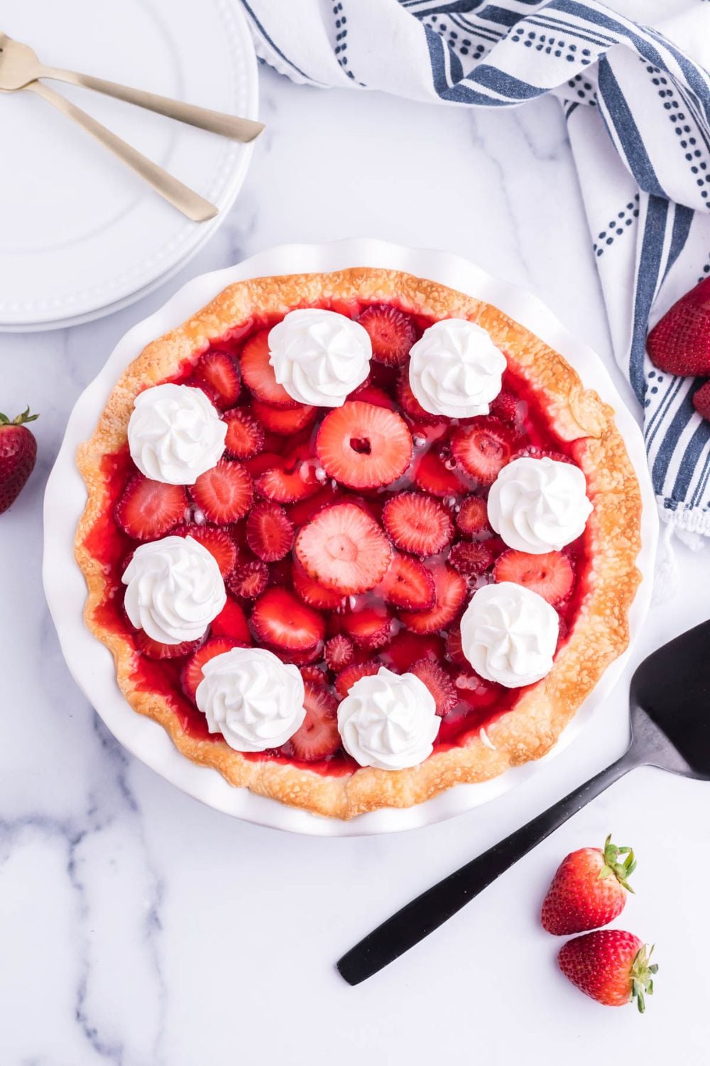strawberry cheesecake pie on plate with overhead look