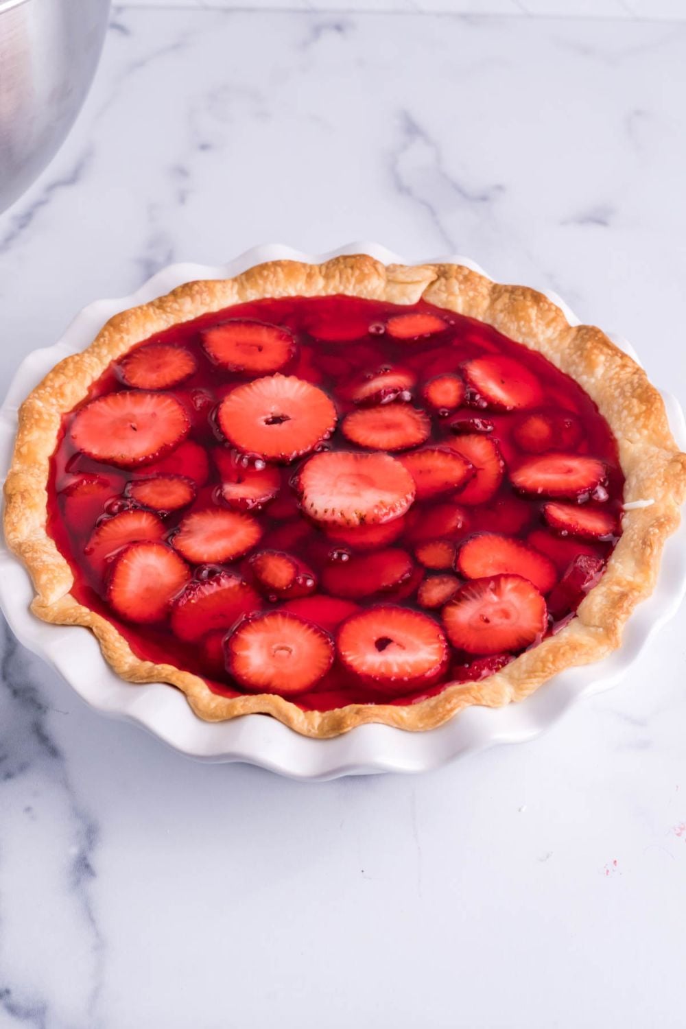 jello mixture poured on top of the pie