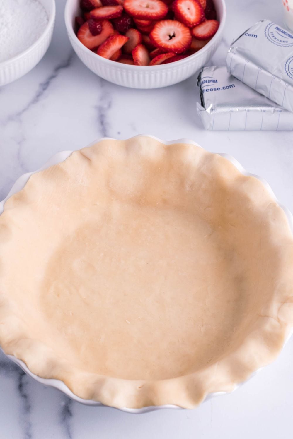 rolled out pie crust in the pie pan