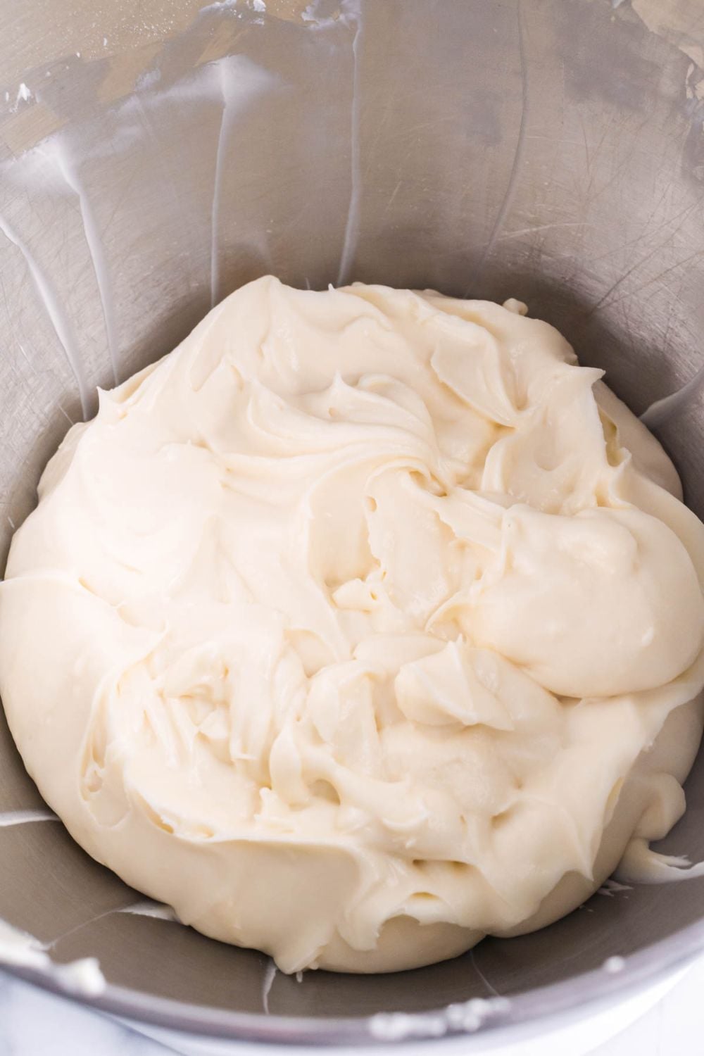 cream cheese mixture in a metal pie