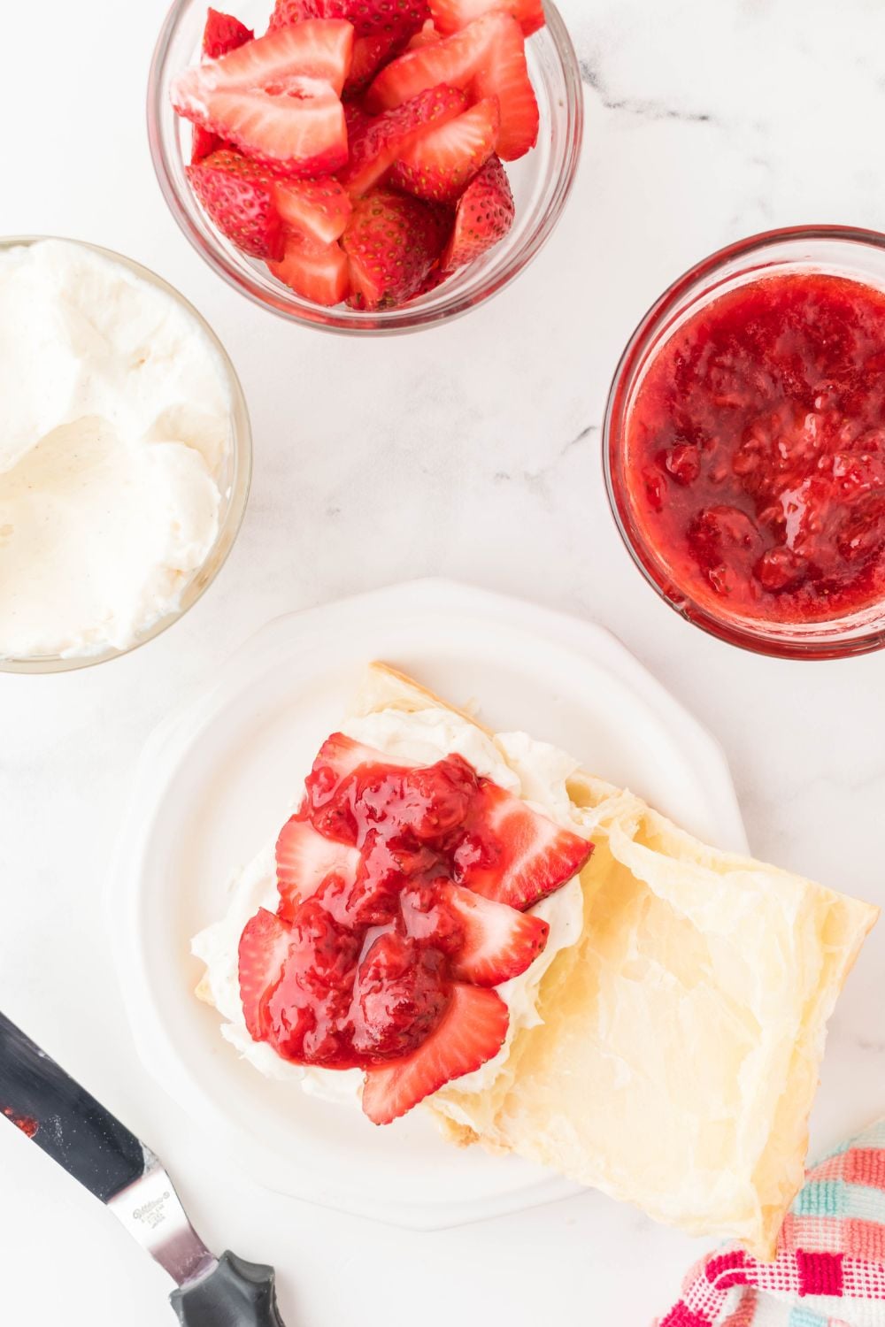 cream cheese mixture and berries in filling of puff pastry