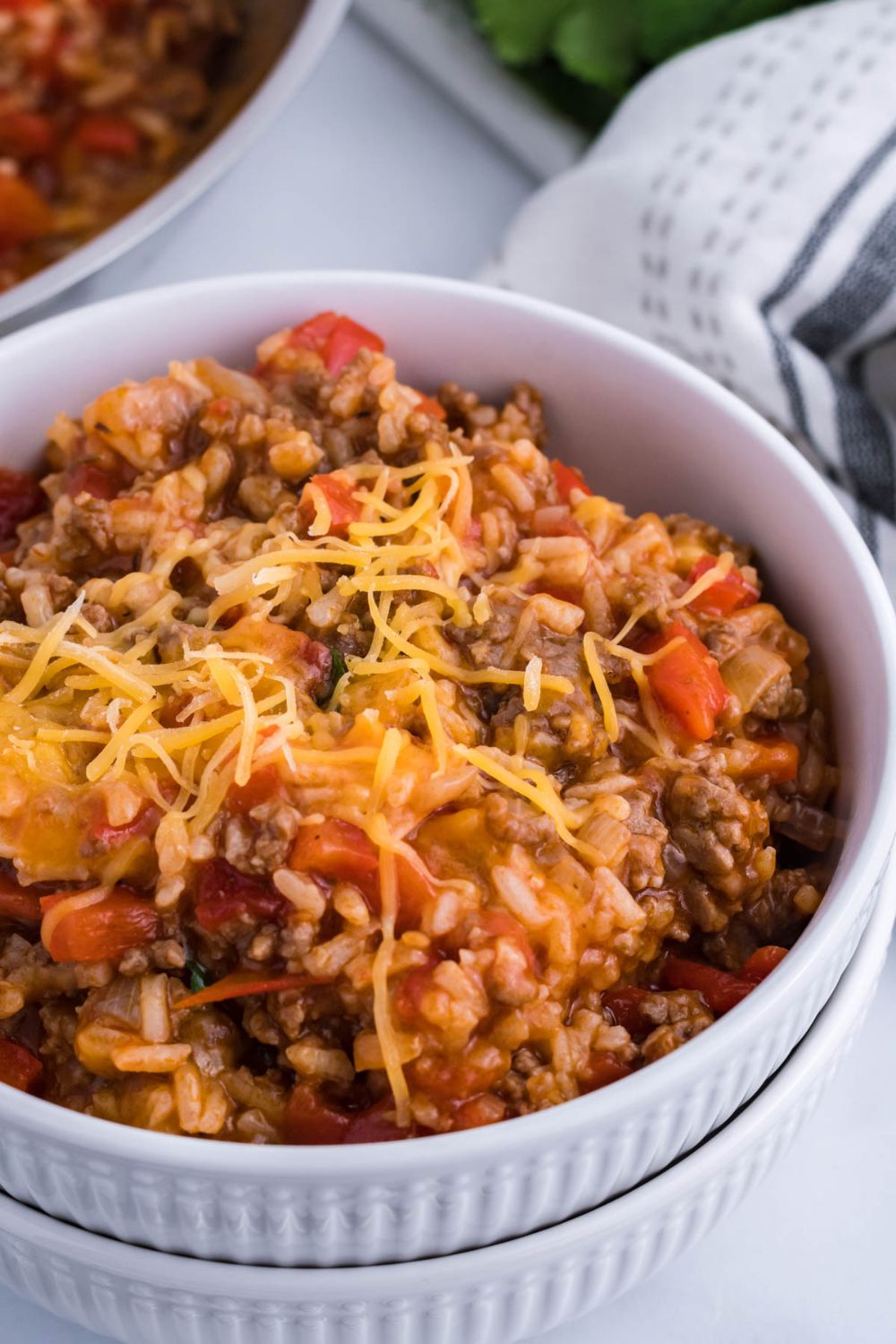 cheesy rice and beef casserole in a bowl