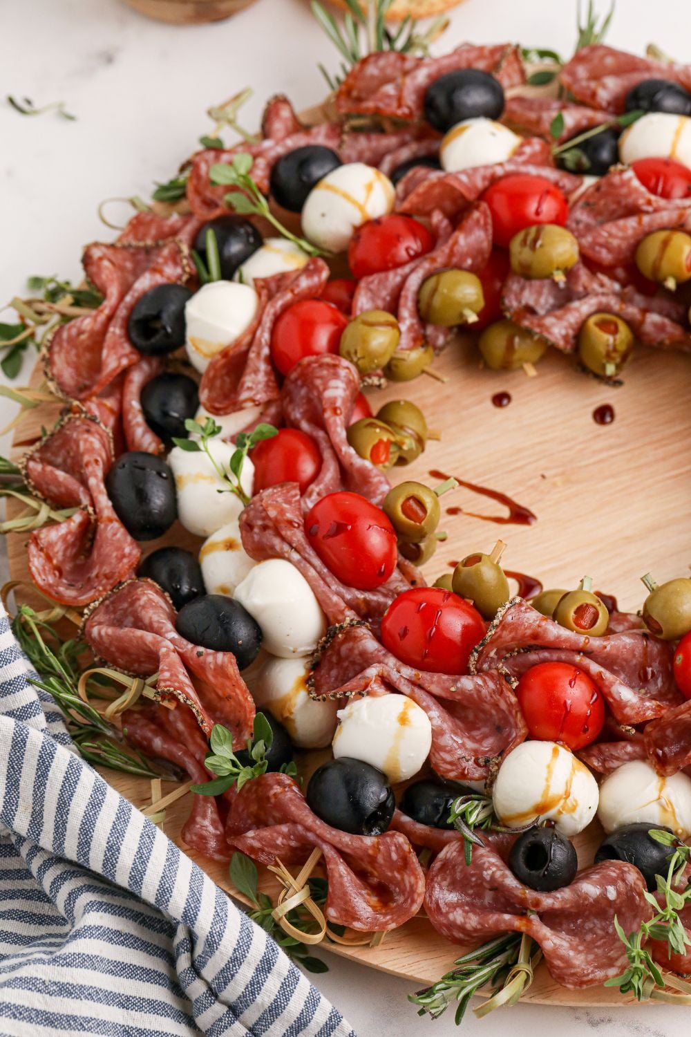 christmas wreath shaped appetizer on wooden table 