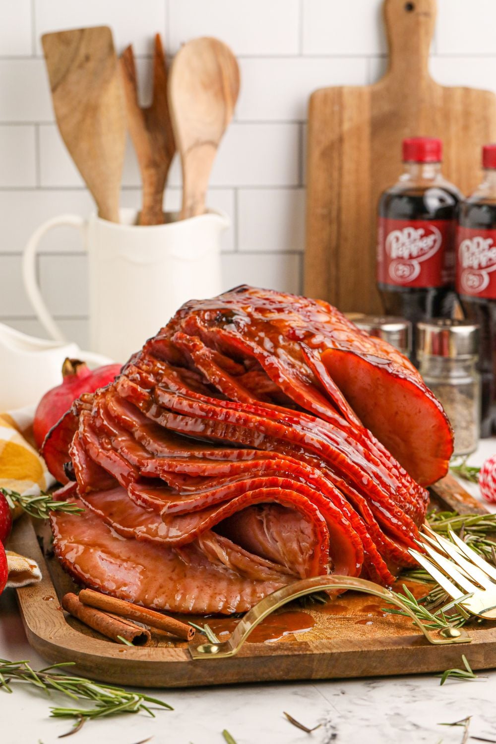 ham on tray with kitchen items behind it