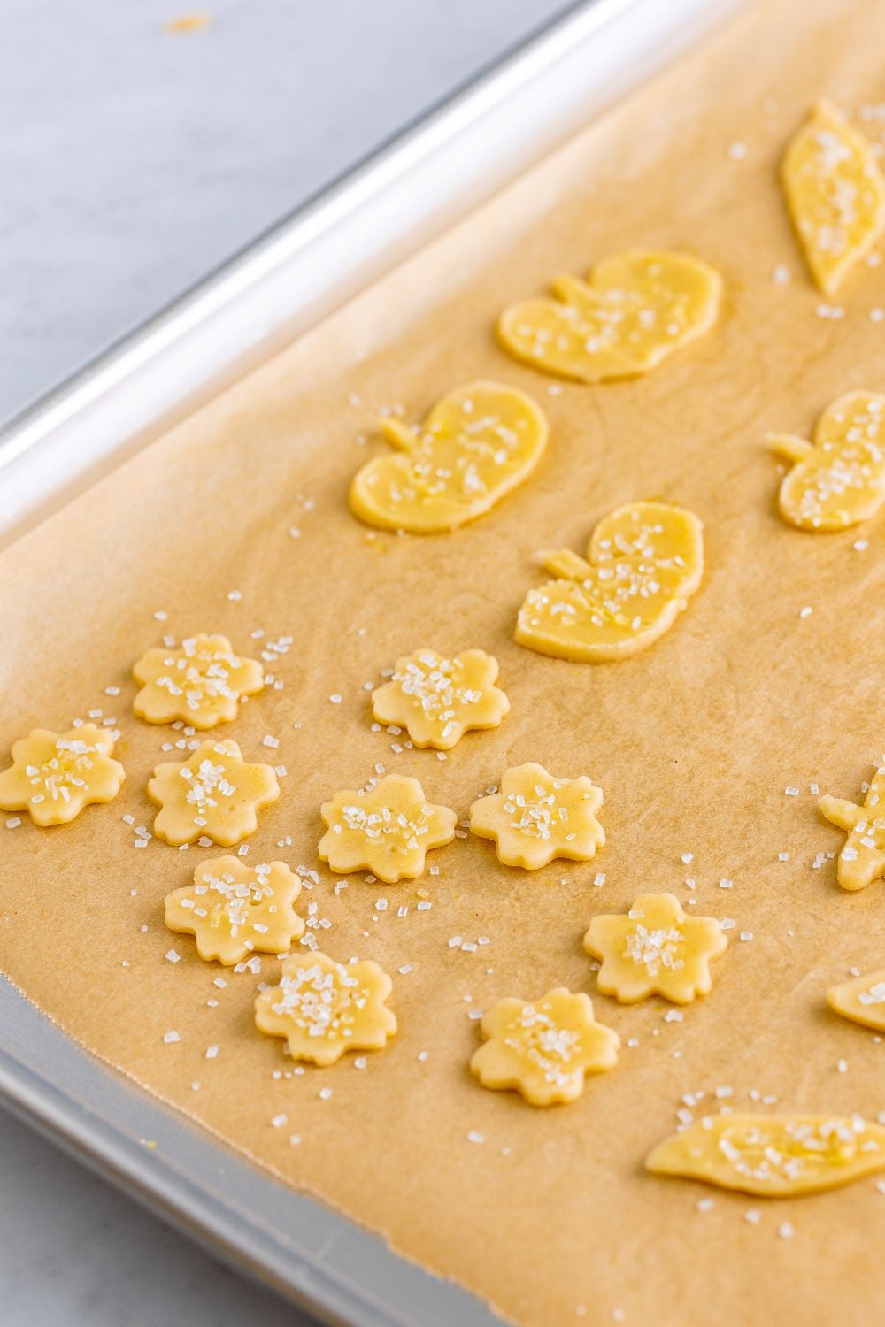 pie crust shaped like leaves on baking tray 