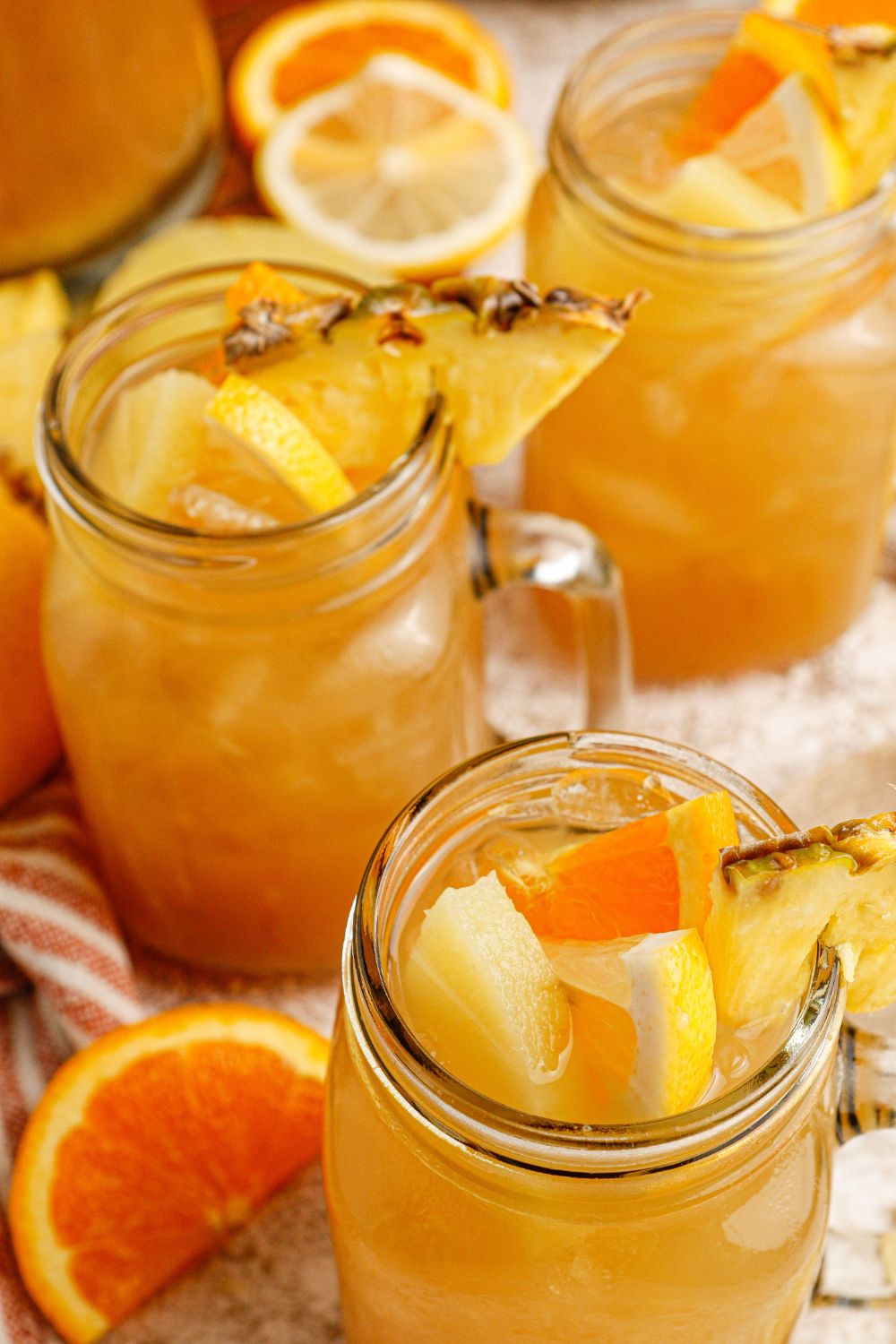 bourbon and iced tea in glasses on table