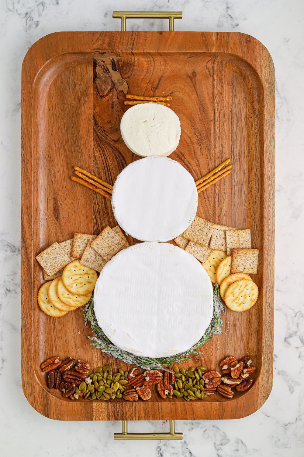 brie shaped snowman serving tray