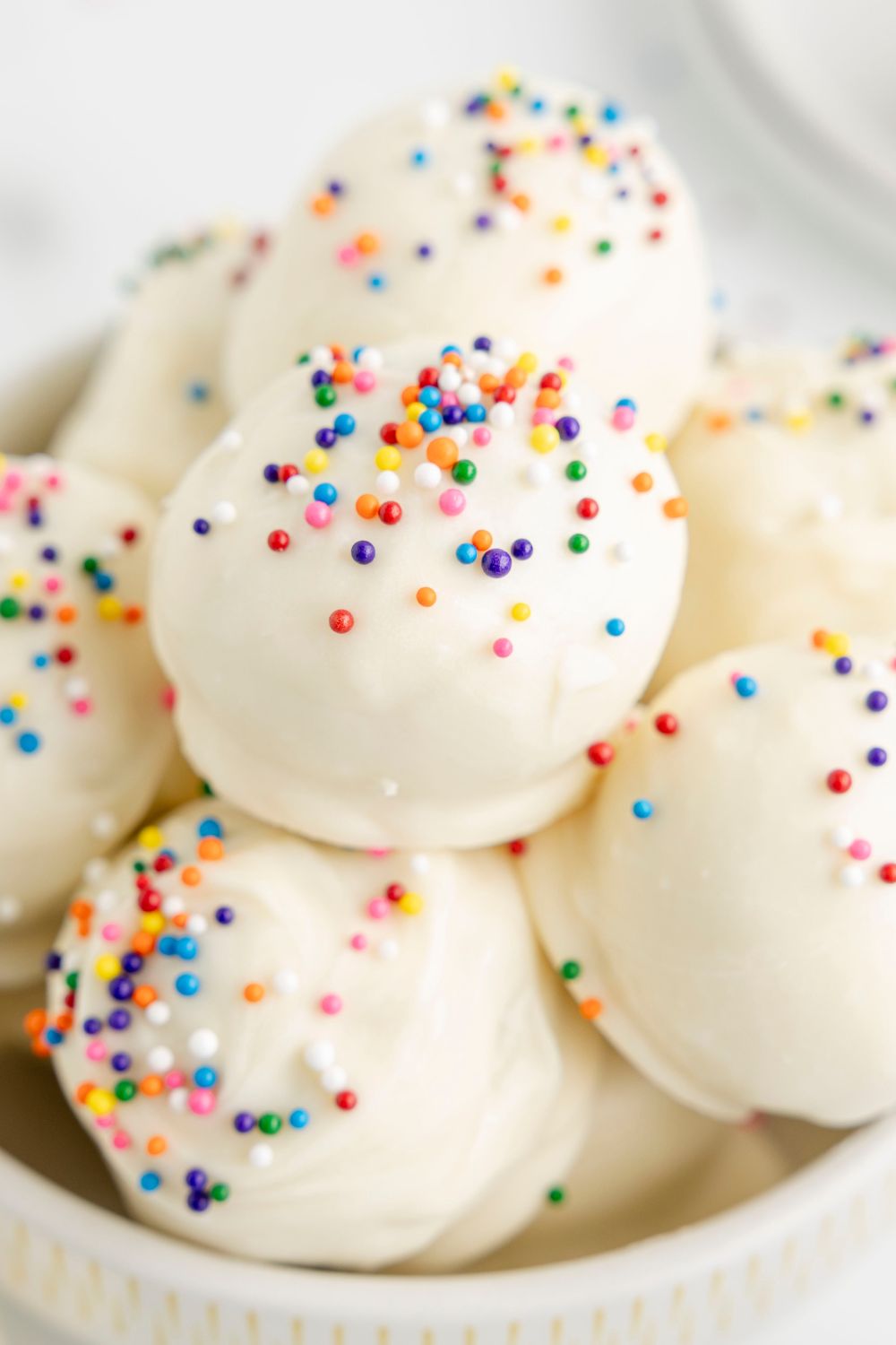 cookie cake balls in a bowl on table 