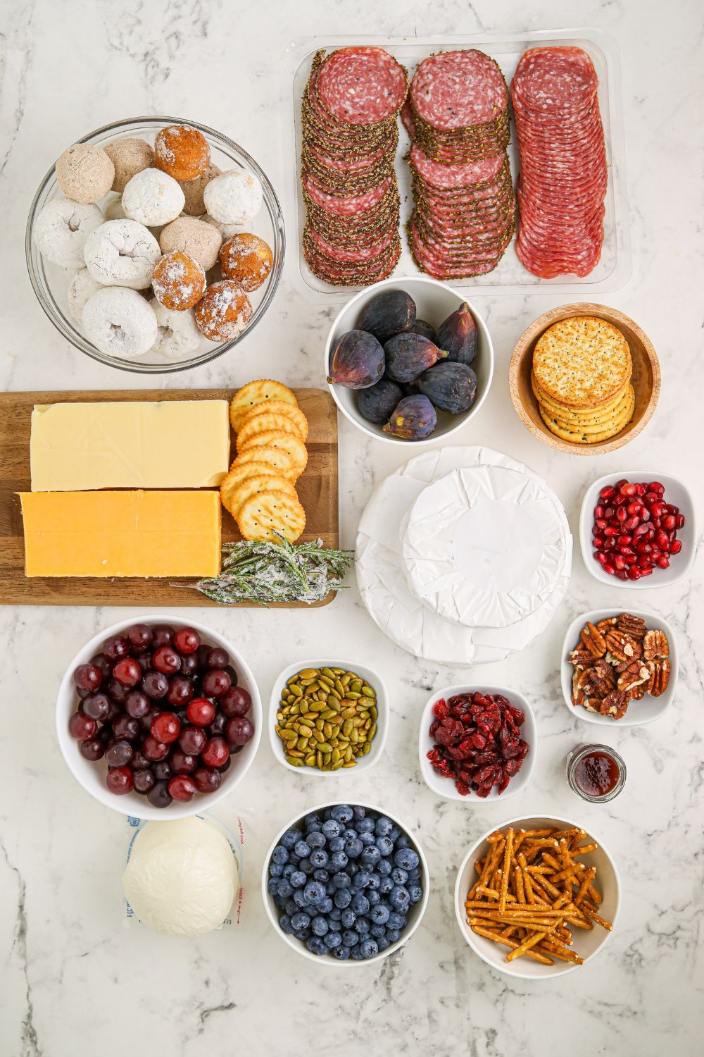 Snowman Charcuterie Board ingredients on table