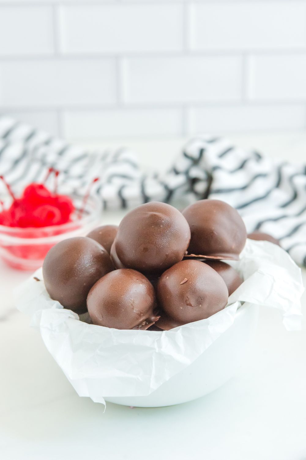 cherry brownie truffles in a bowl on table
