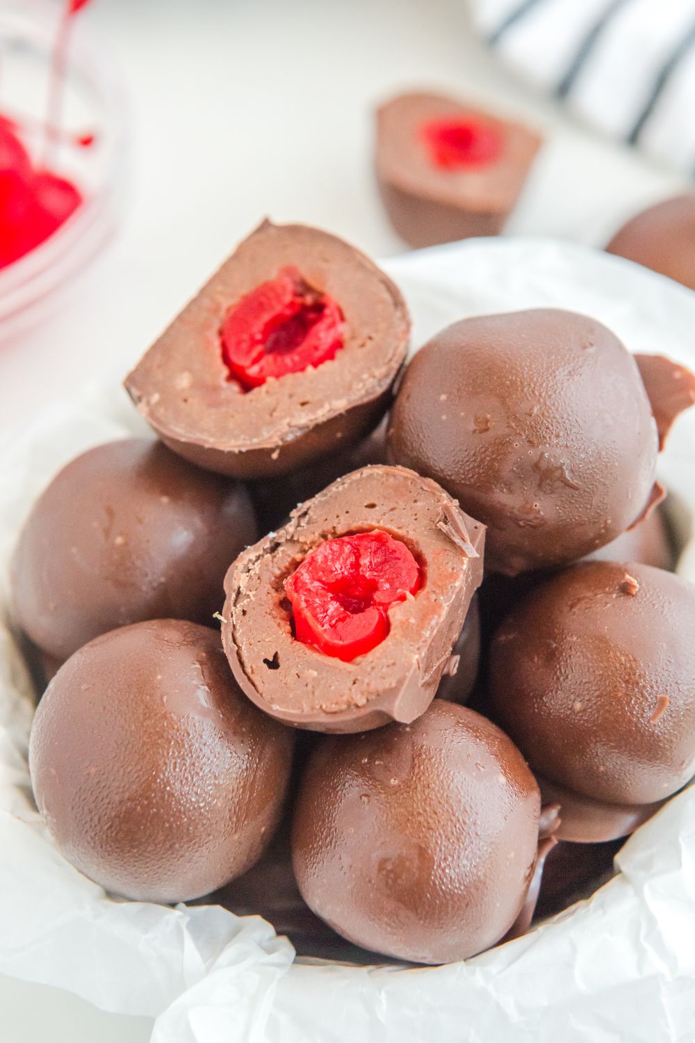 Cherry Brownie Bombs cut in half and placed in a bowl on table 