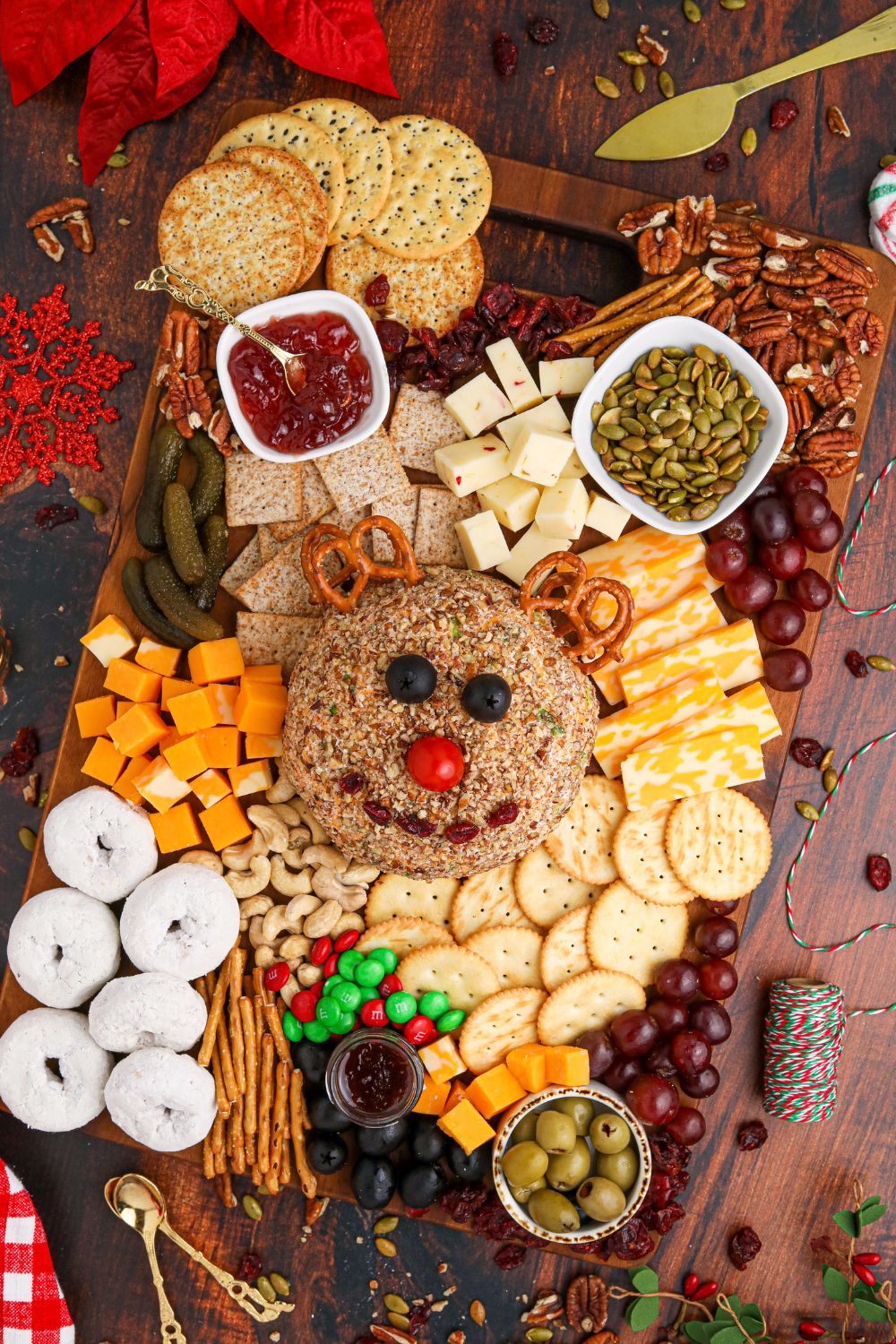 charcuterie board with a cheeseball in the center
