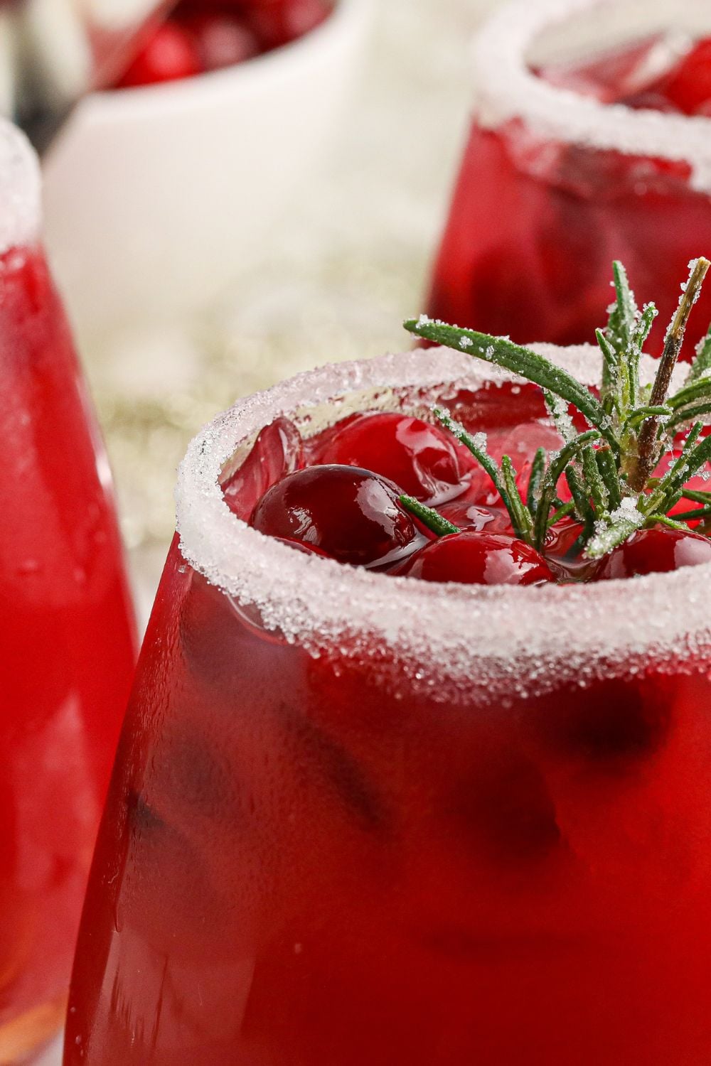 Mistletoe Margarita close up in glass that is rimmed with salt 