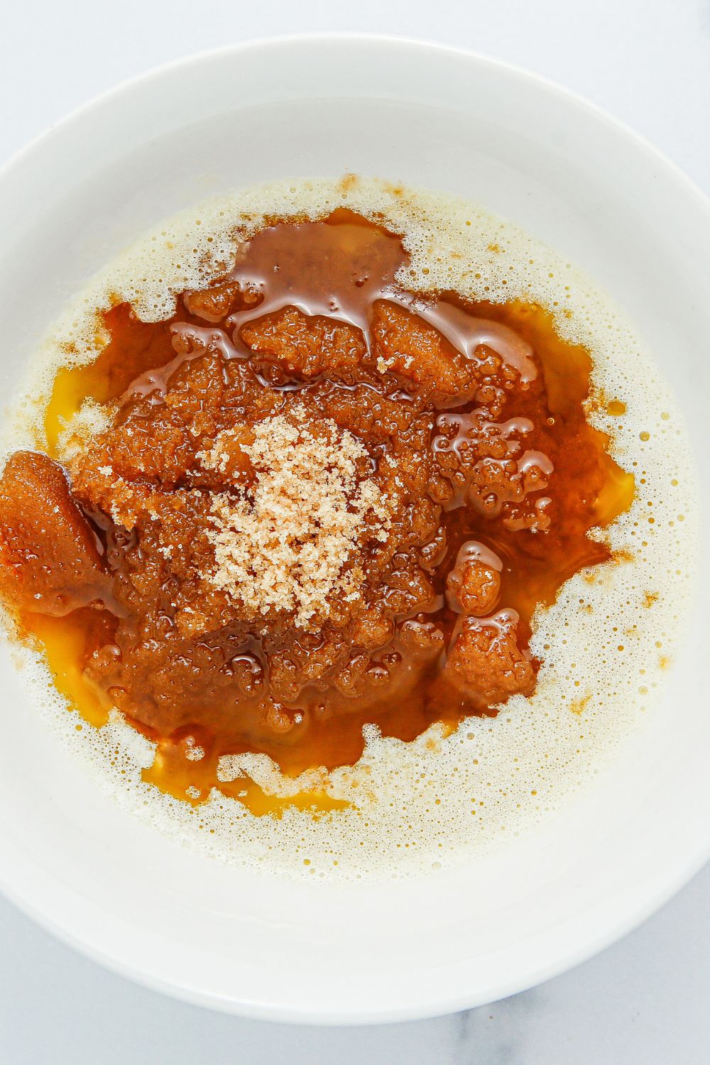 butter and brown sugar mixture in a mixing bowl