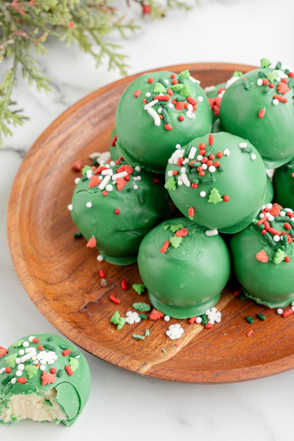 cookie truffles on a wooden plate