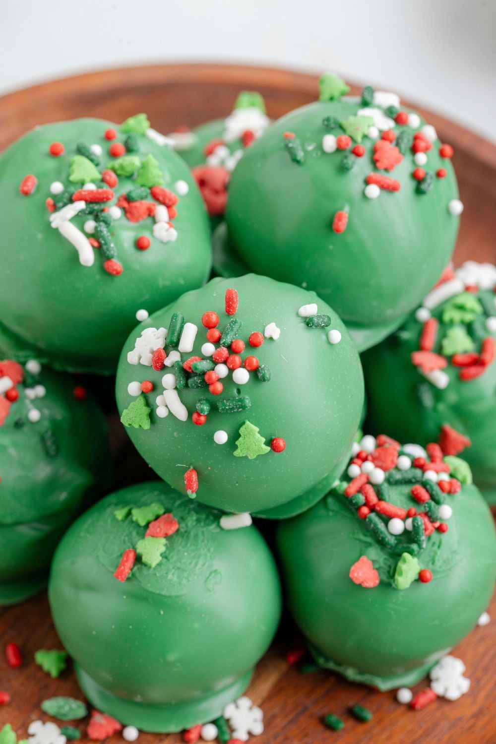 sugar cookie truffles stacked on platter