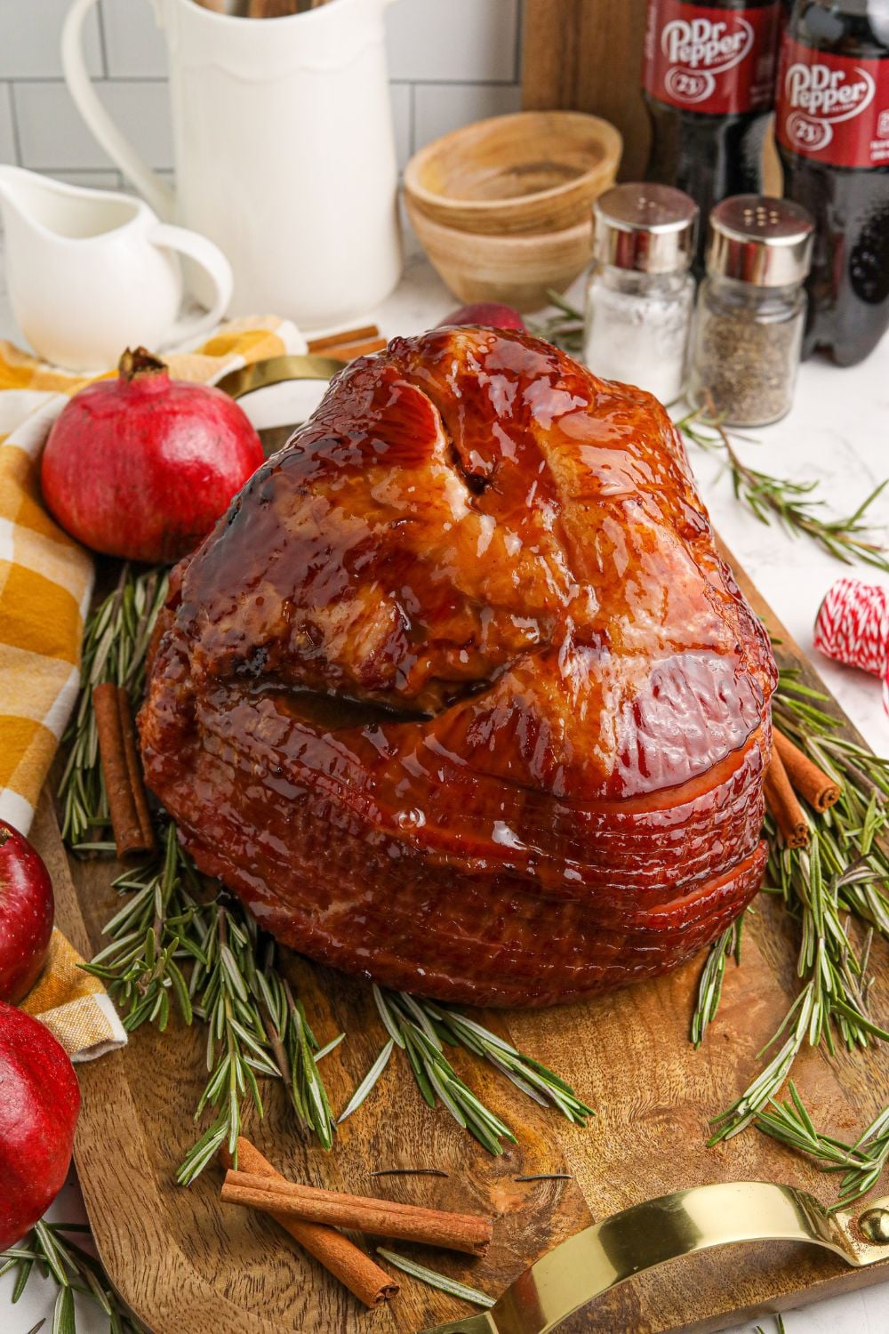 glazed ham on wooden serving tray