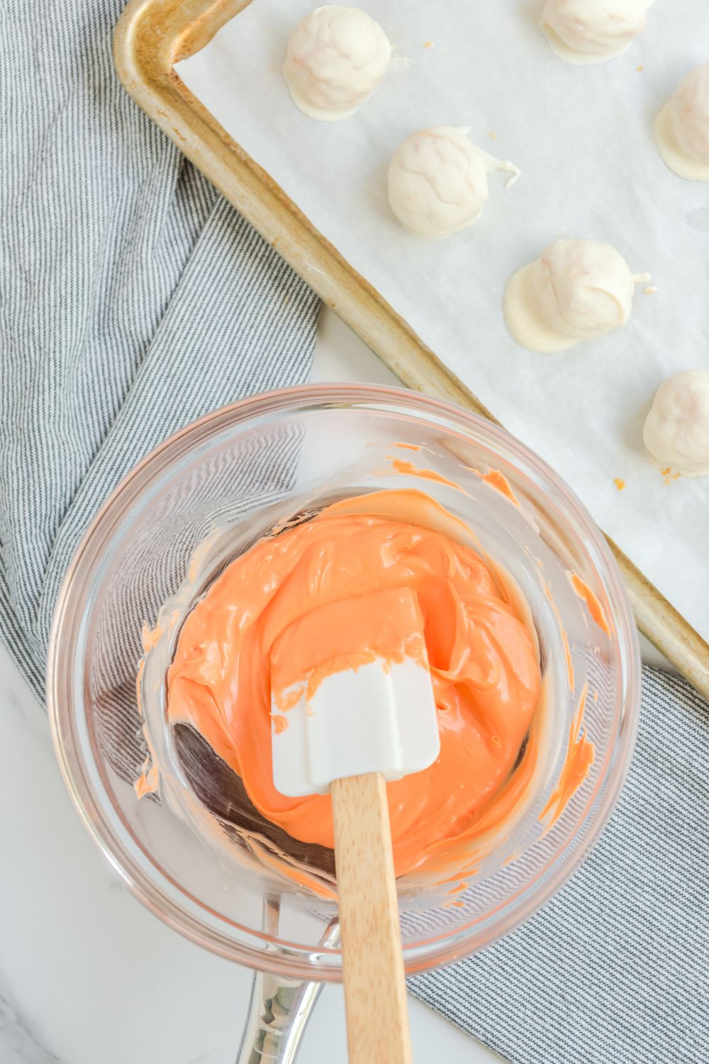 orange candy melts in bowl 
