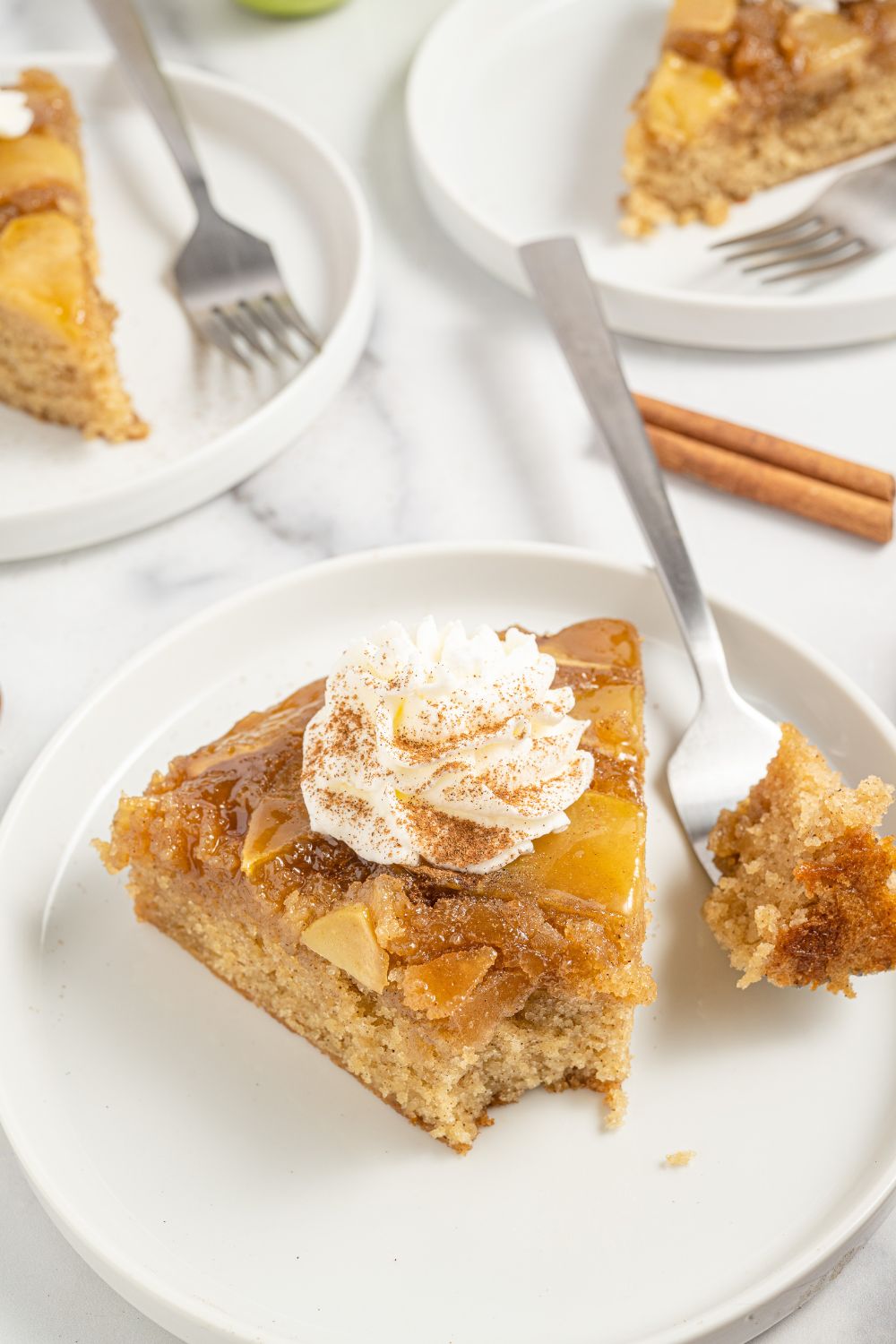 cake on a plate with a fork and cake