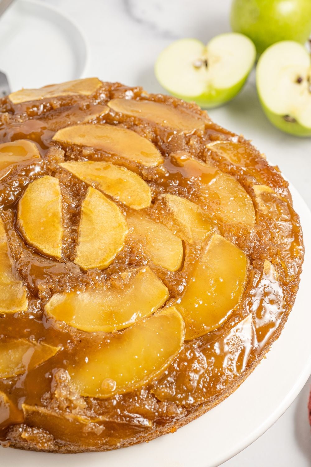 side view of an upside down cake on a platter