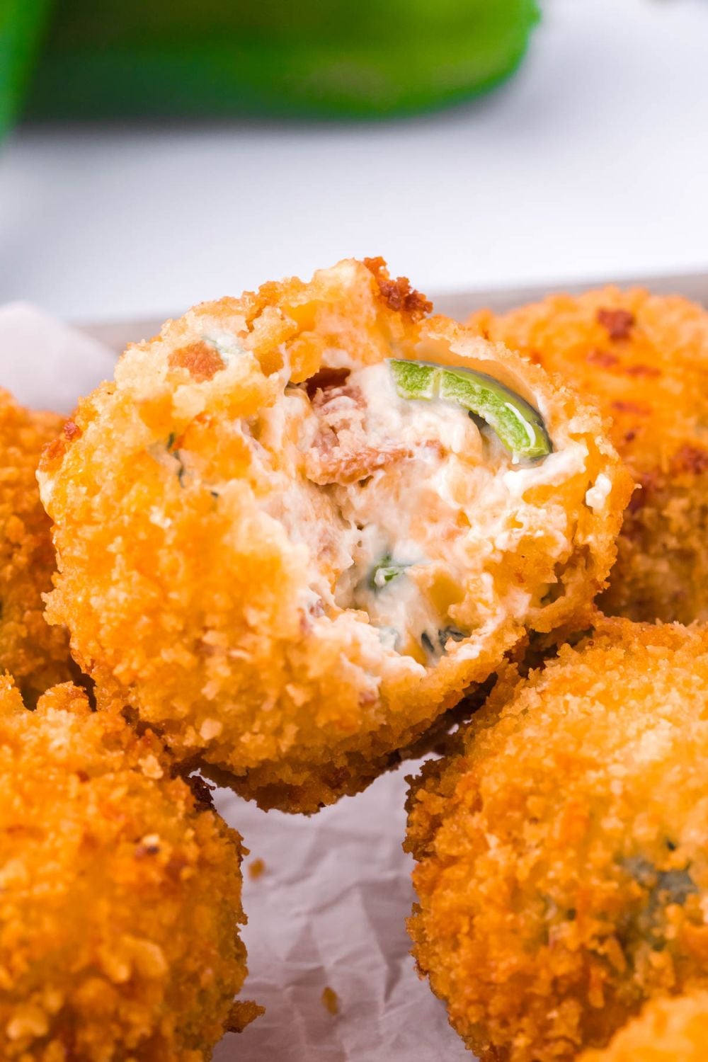 Jalapeno Popper Bite with a bite taken out