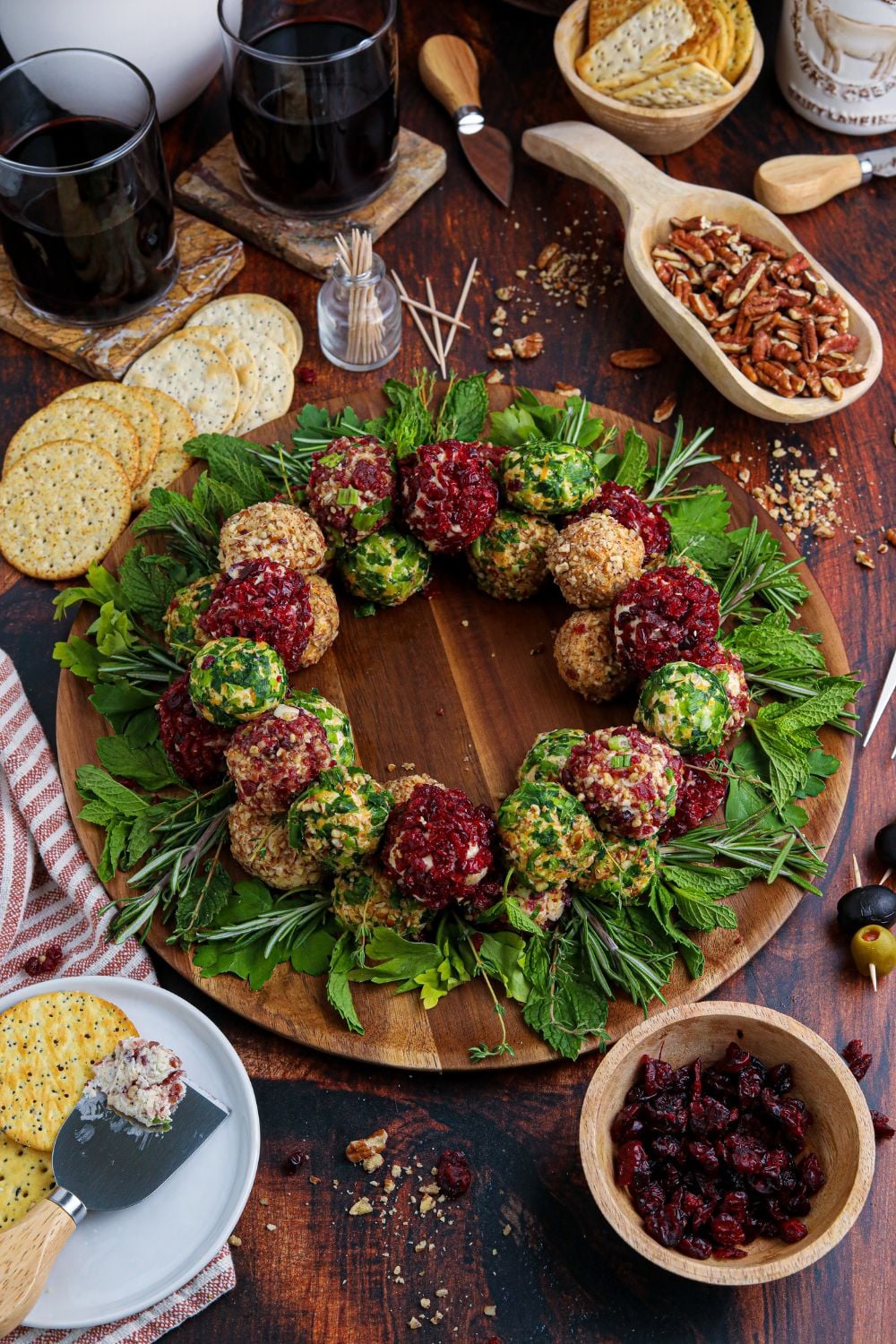 wreath shaped appetizer on table with food all around it