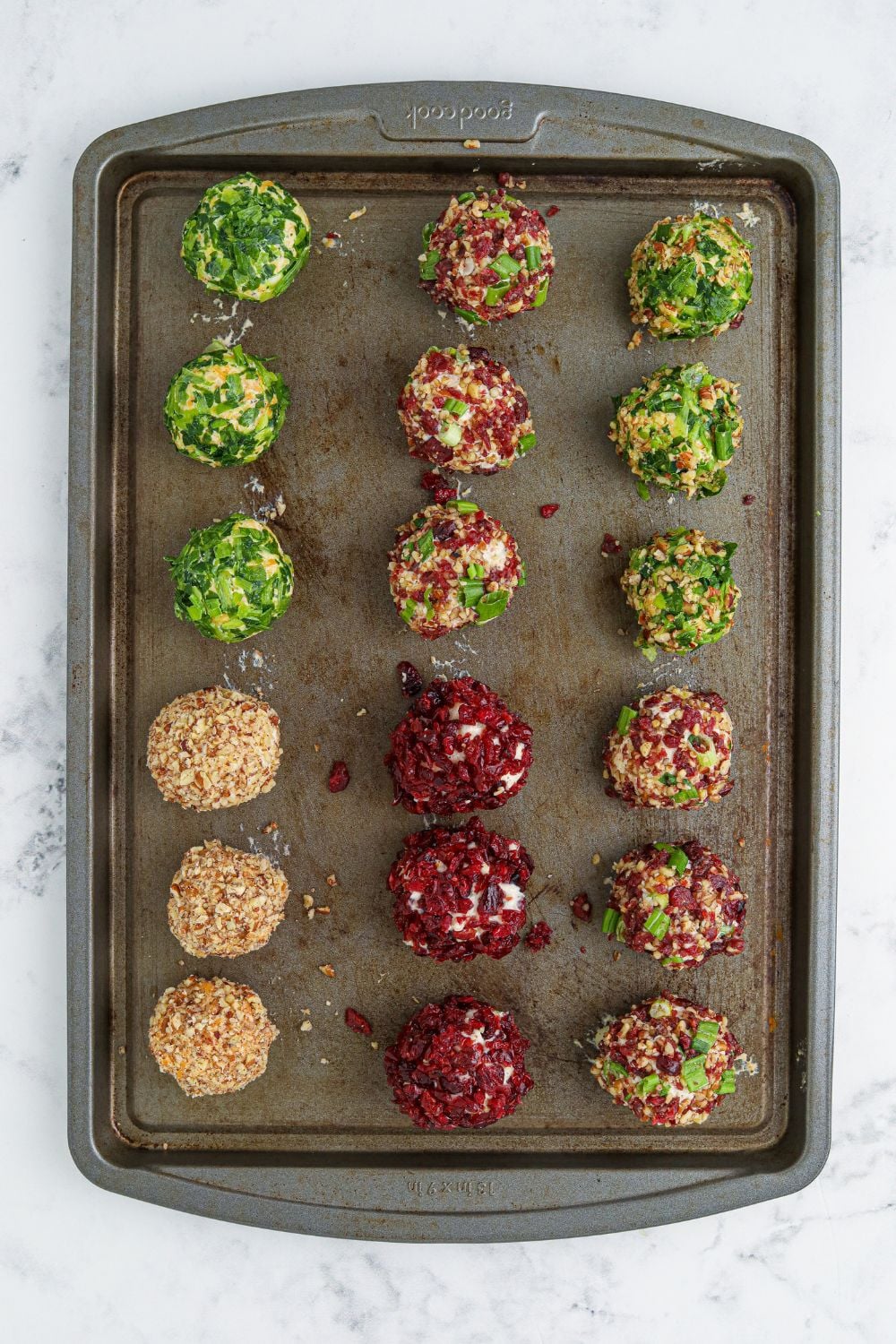 cheeseballs on cookie sheet