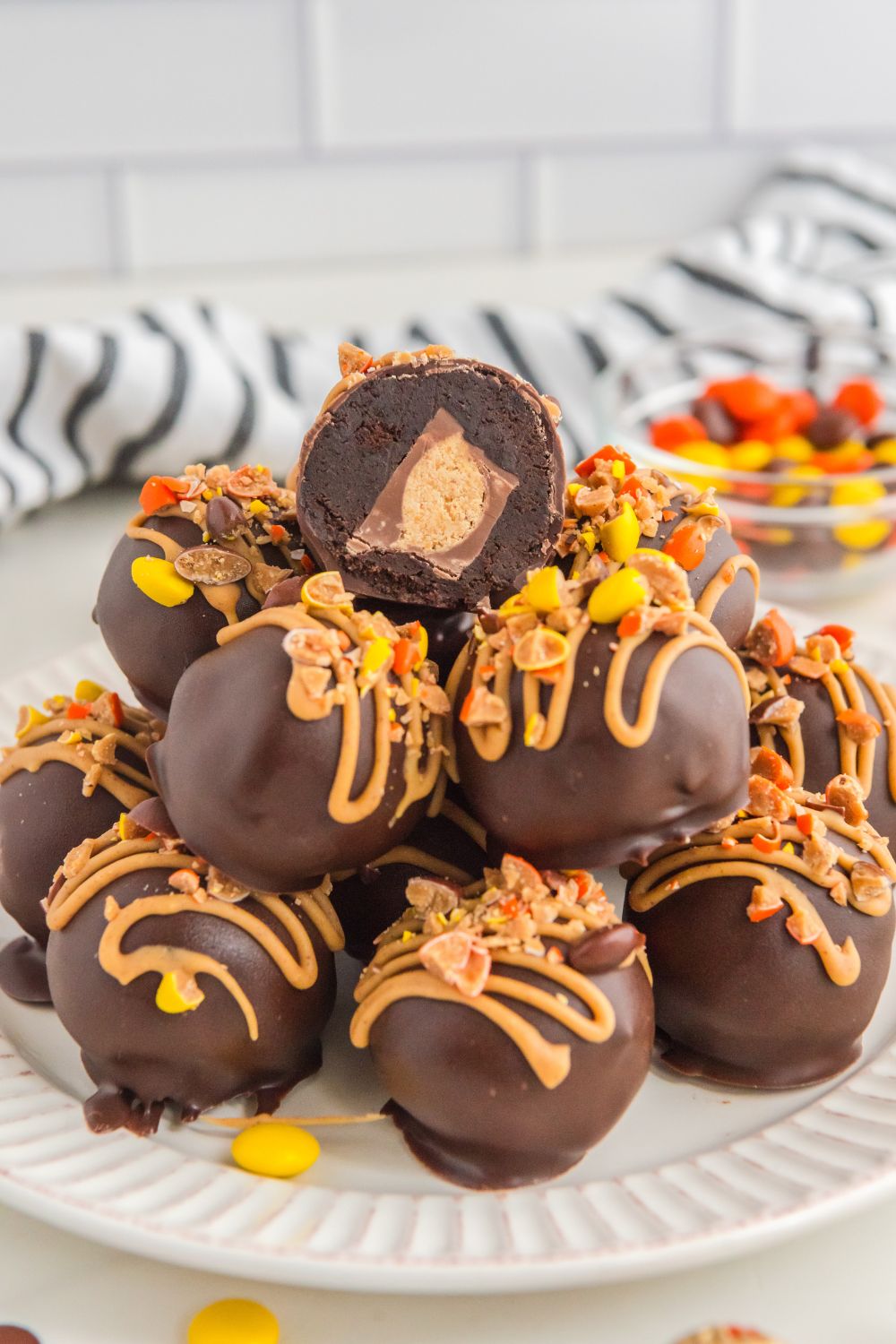 oreo pb balls on plate with towel behind it