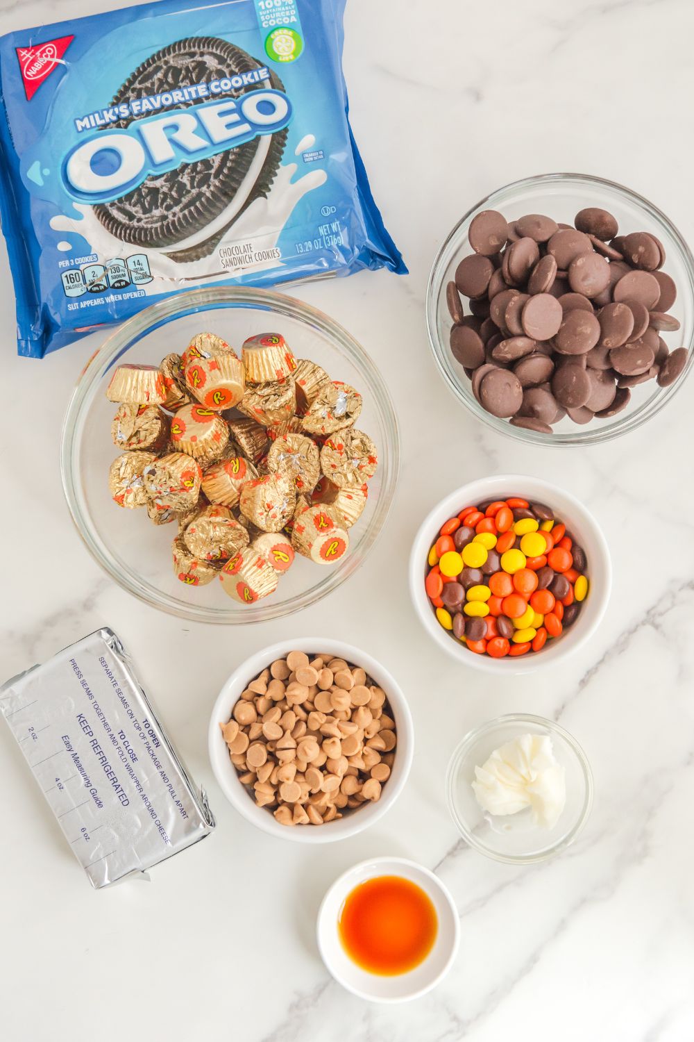 ingredients for Reese's Oreo Balls on counter in bowls