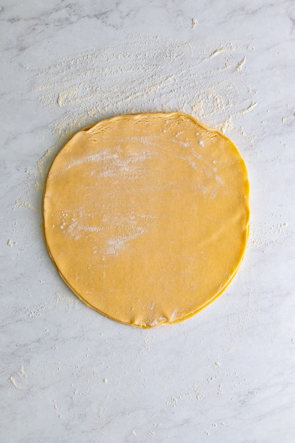 pie crust rolled out on table 