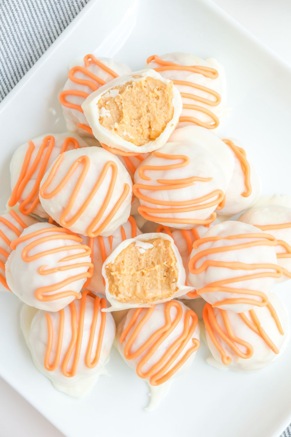 White Chocolate Pumpkin Truffles on table 