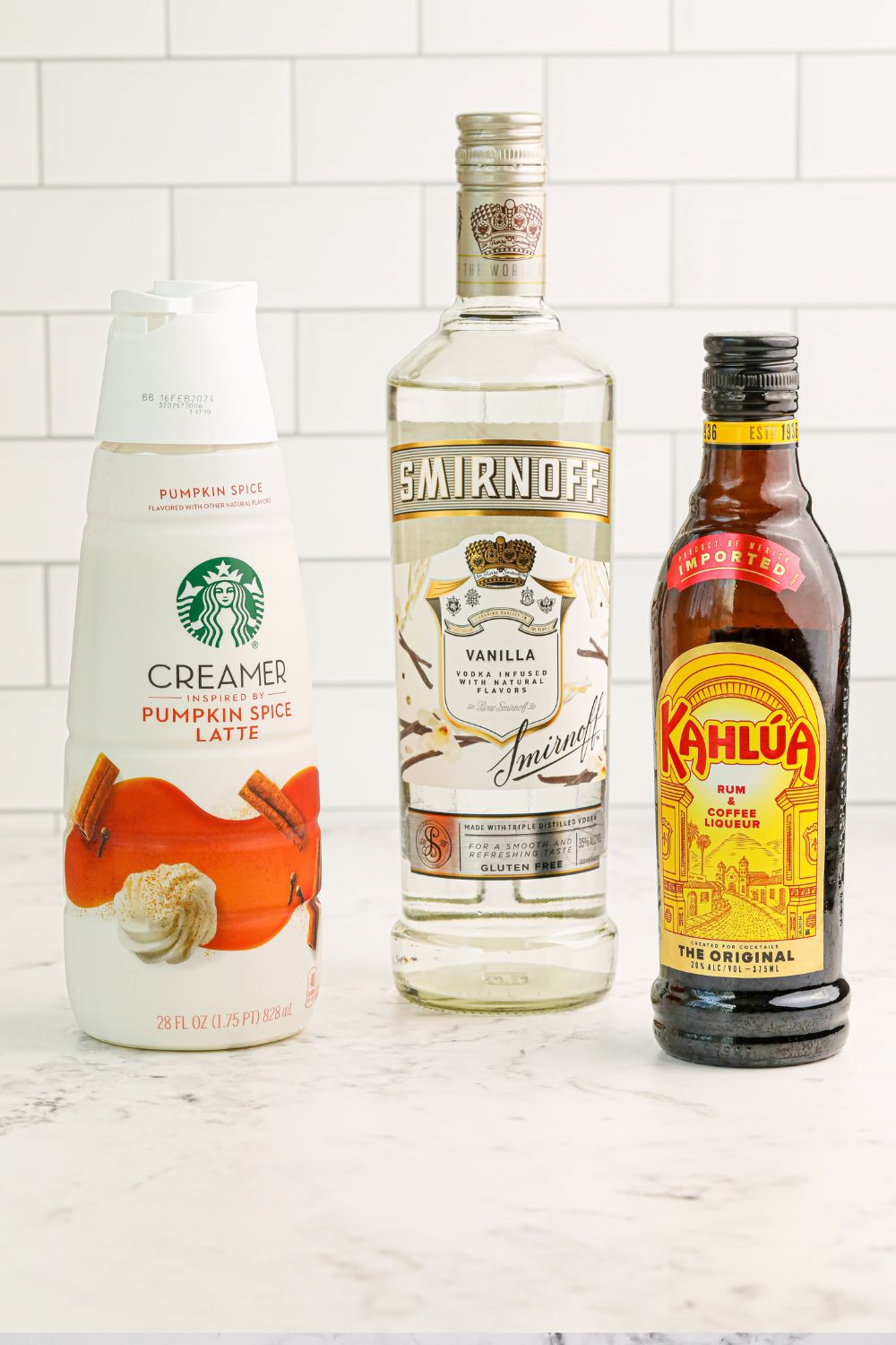 ingredients ofr Pumpkin White Russian on white table 