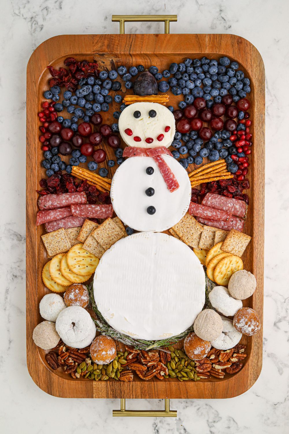 assembly of Snowman Charcuterie Board