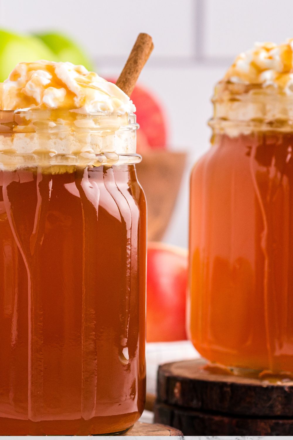 starbucks caramel apple cider in mugs on table