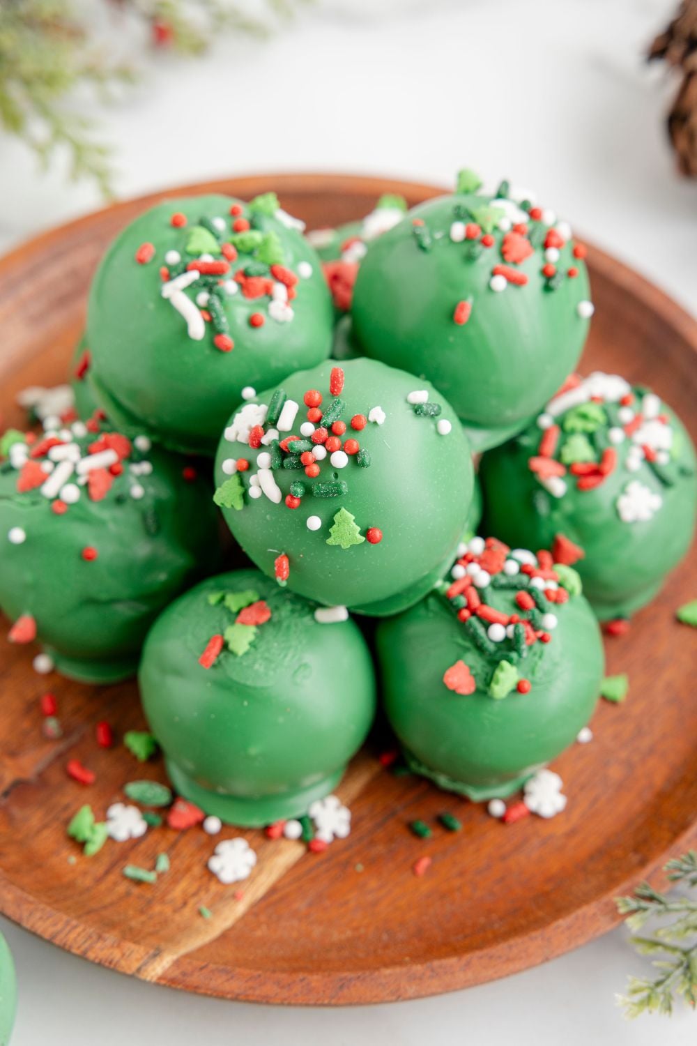 Lofthouse Christmas Truffles on a platter with sprinkles around it