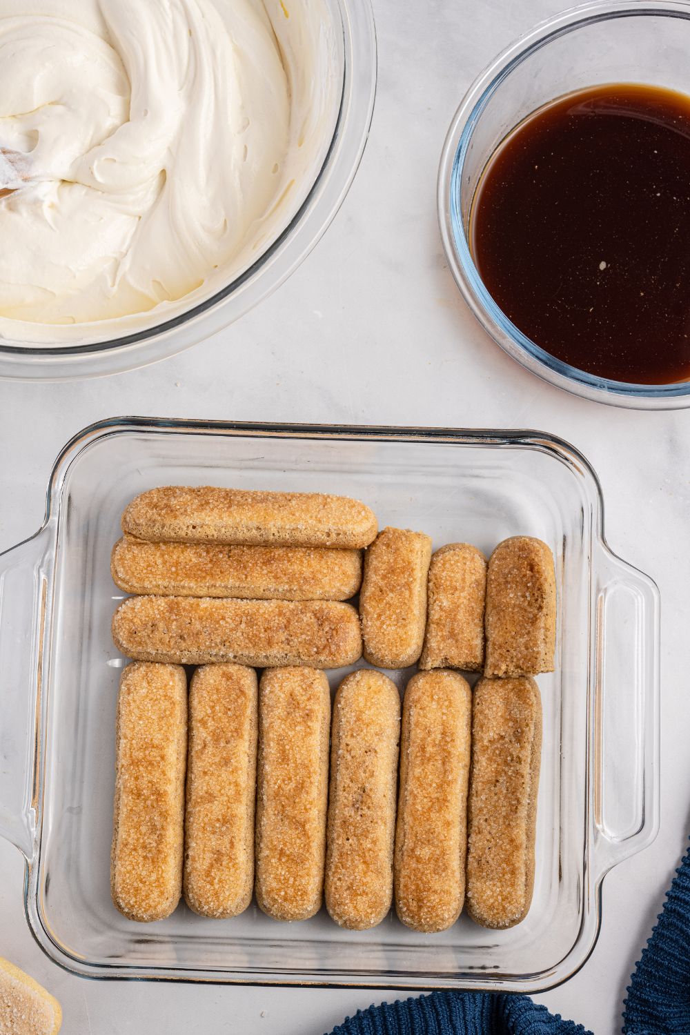 coffee dipped lady fingers in pan