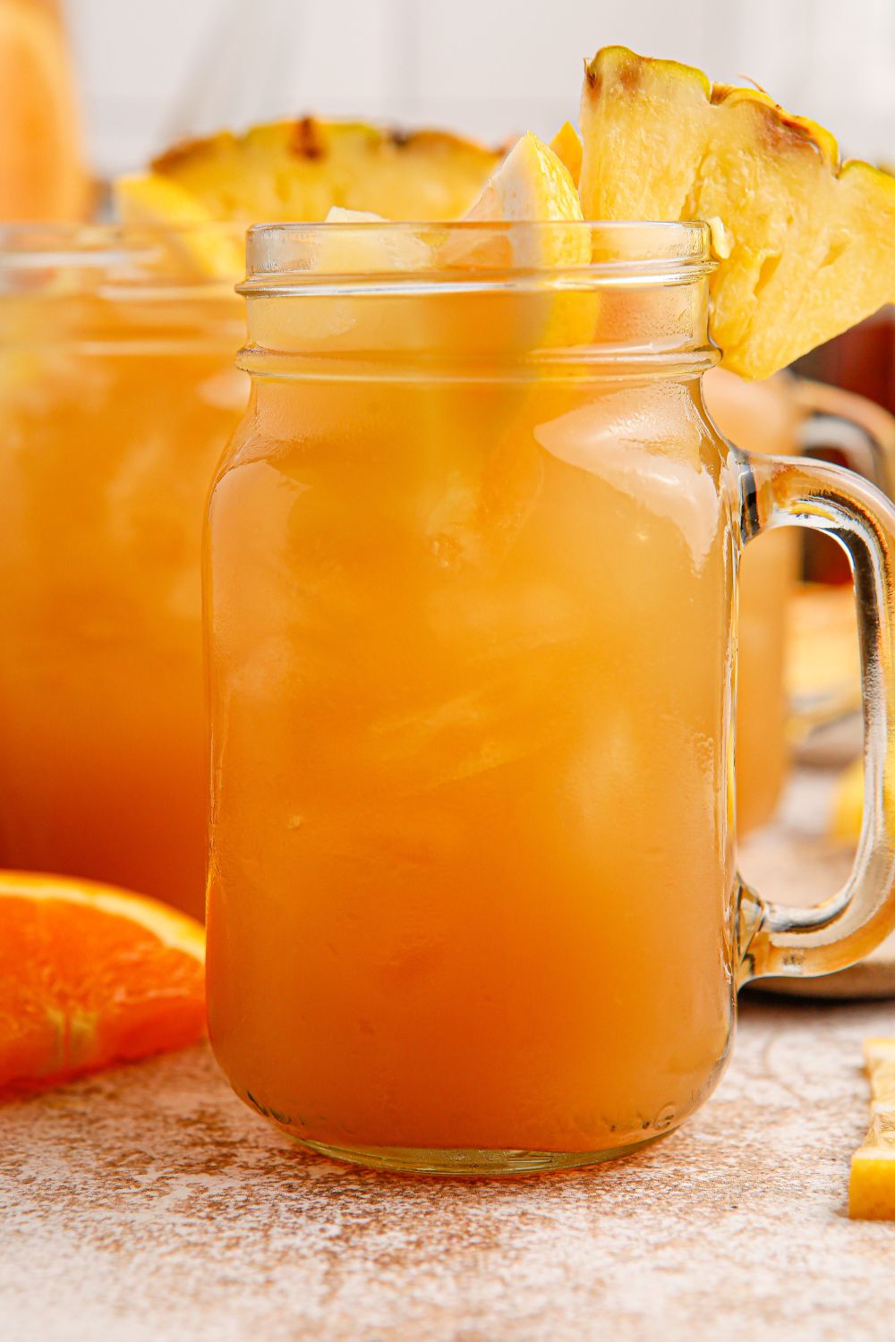 Touchdown Tea in a mason jar garnished with fruit