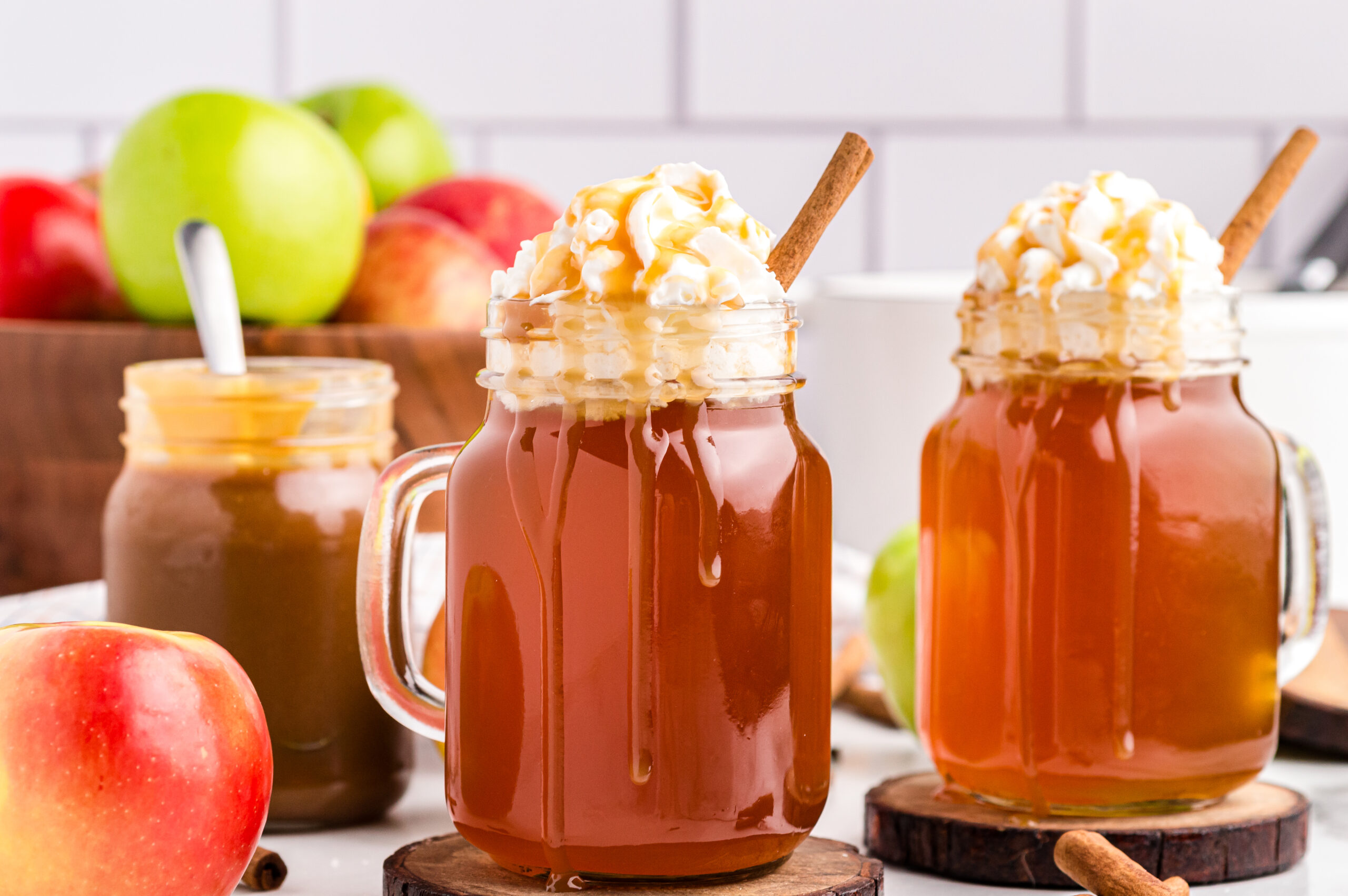 starbucks caramel apple cider in mugs on table